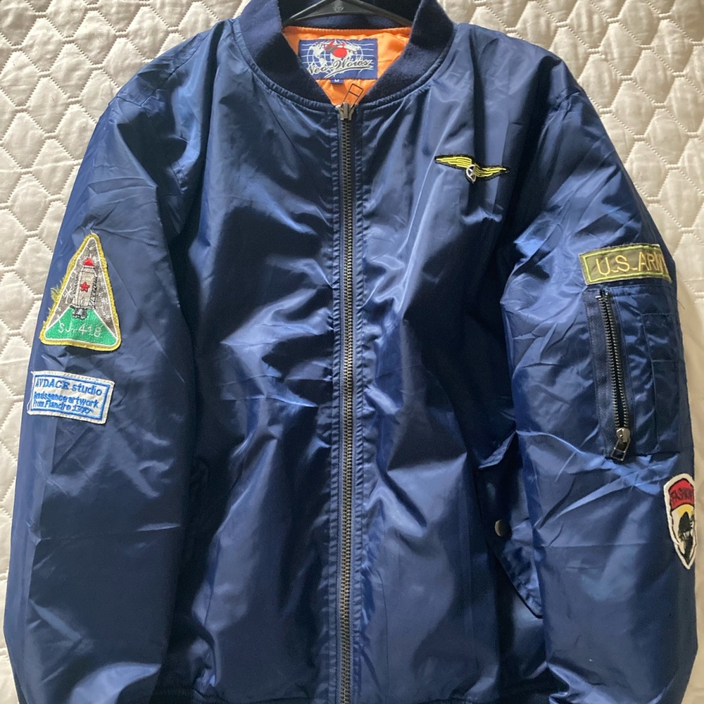Navy blue NASA puffer jacket with Hermes Orange Interior